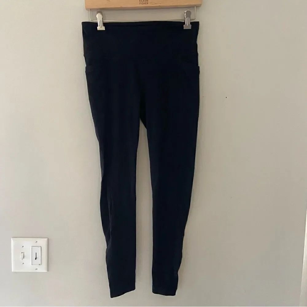 Athleta black full length zippered bottom leggings sizzle medium.